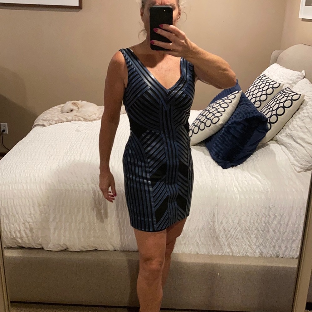 Navy leather over black mini dress